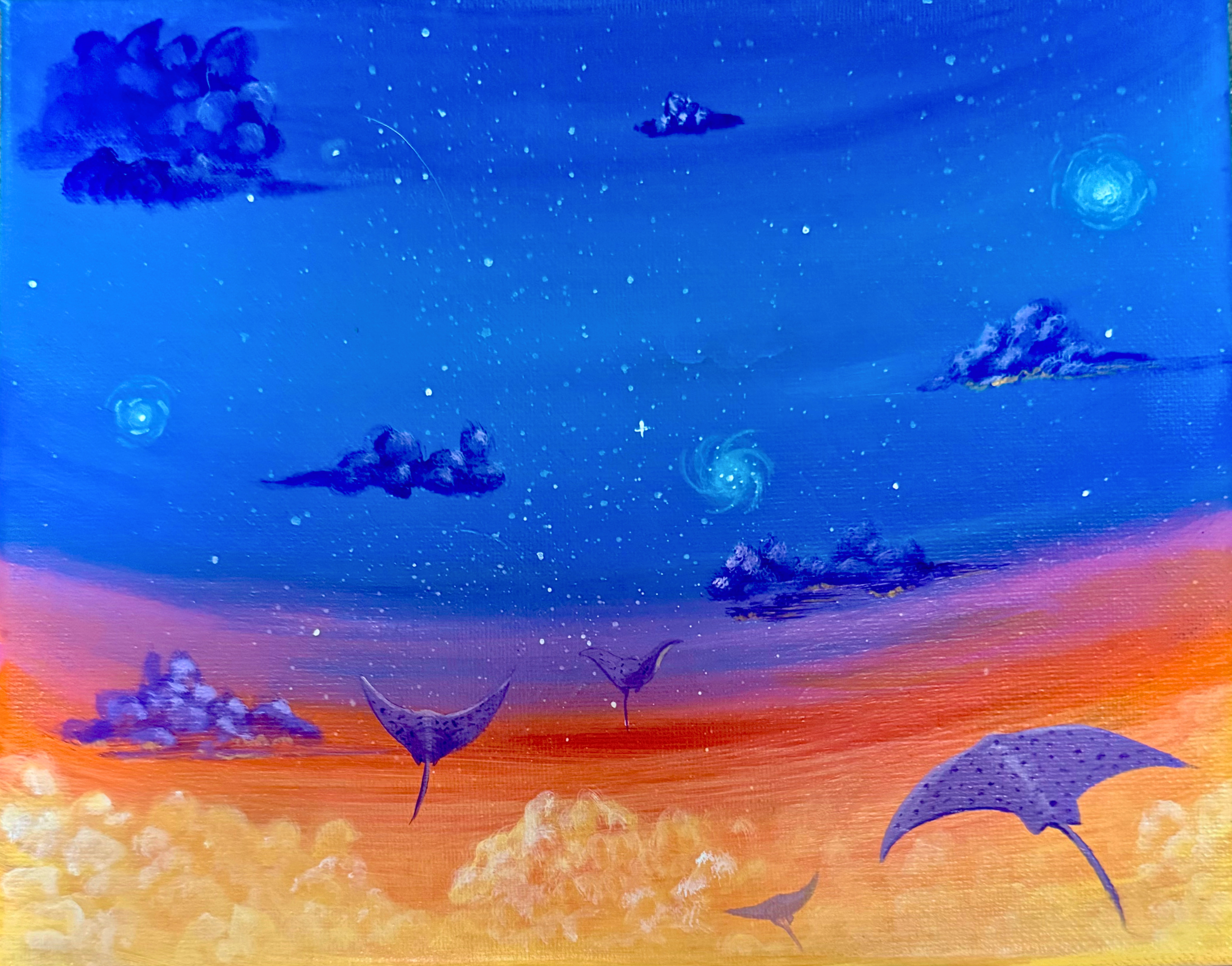 Eagle rays soaring into the night sky