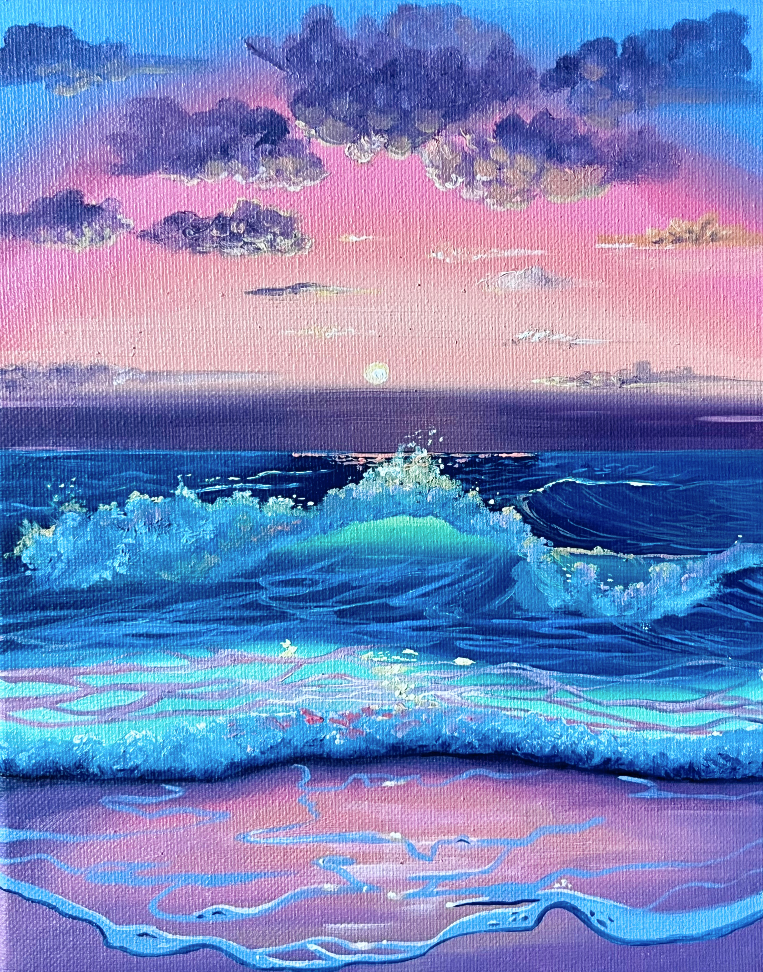Teal waves against a peachy sunset