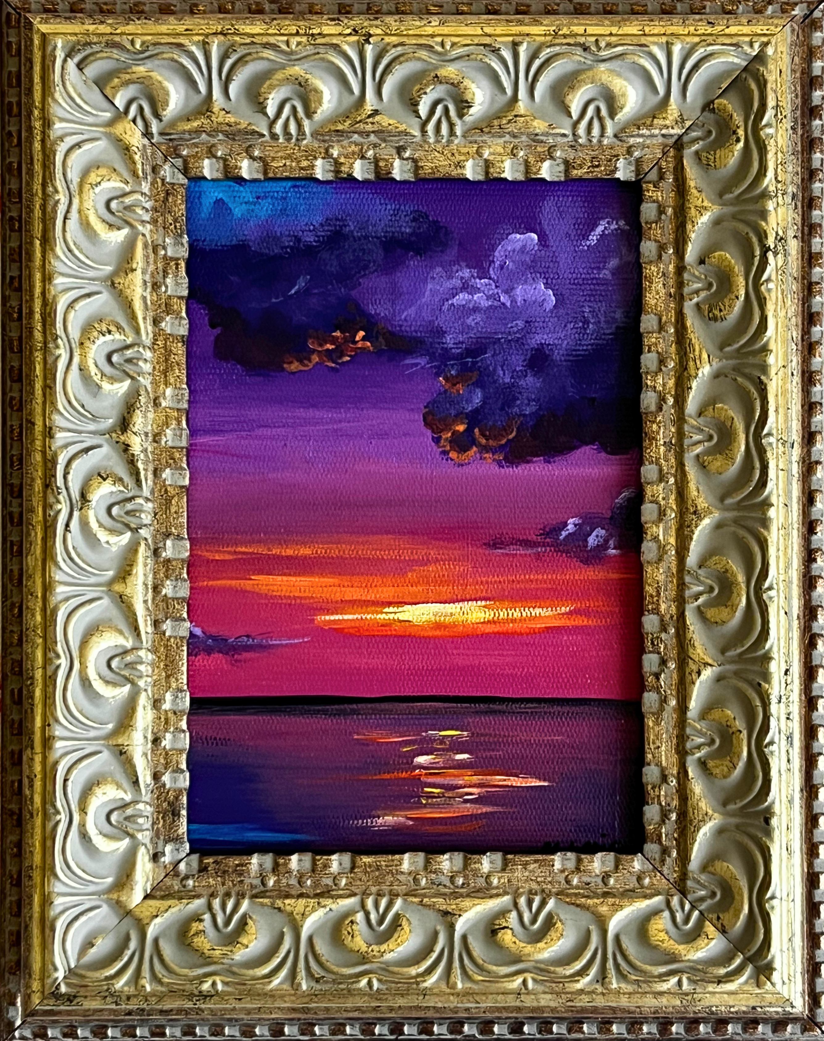 Red and pink sunset over a calm ocean