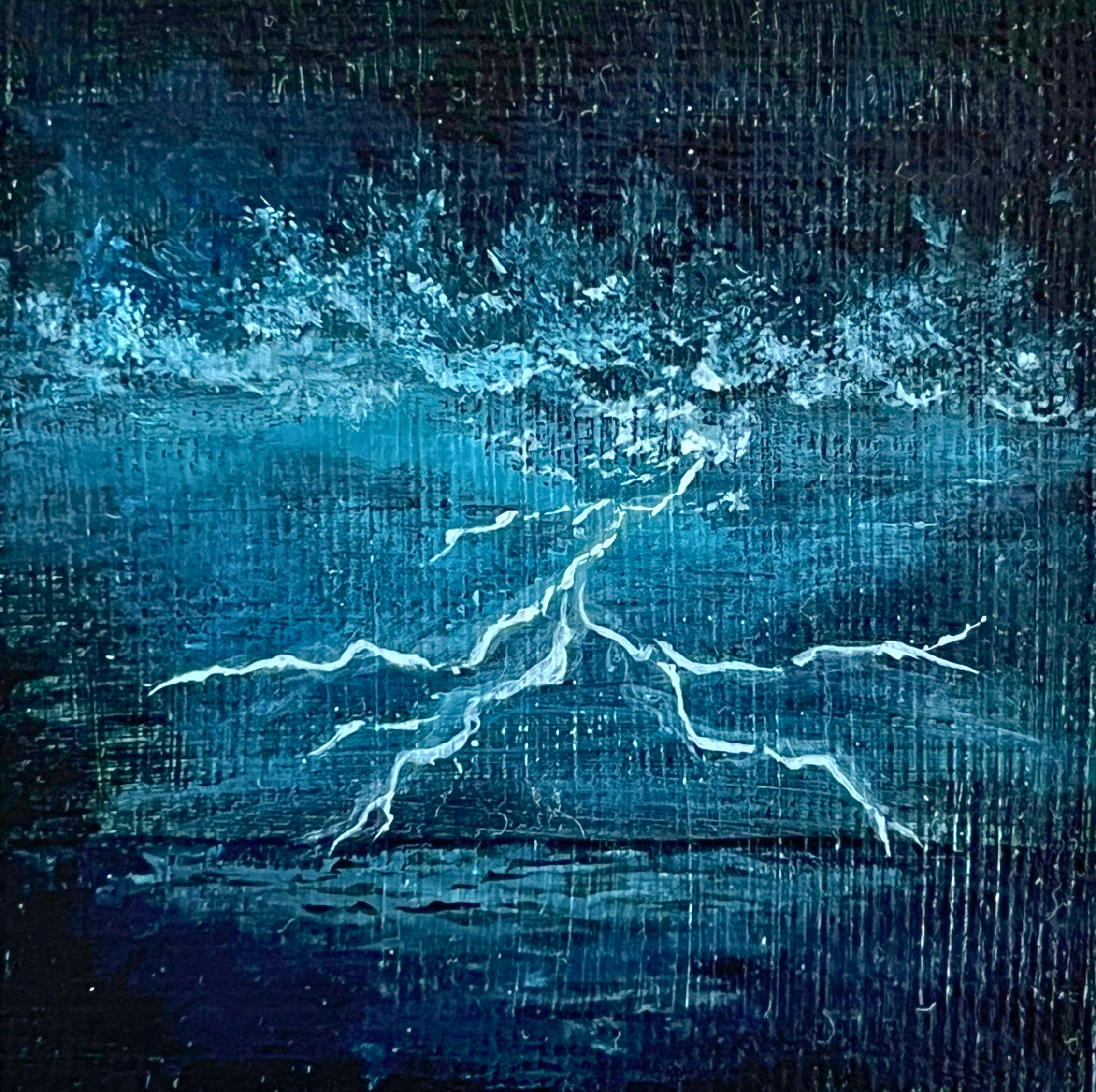 Nighttime lightning strike on the ocean
