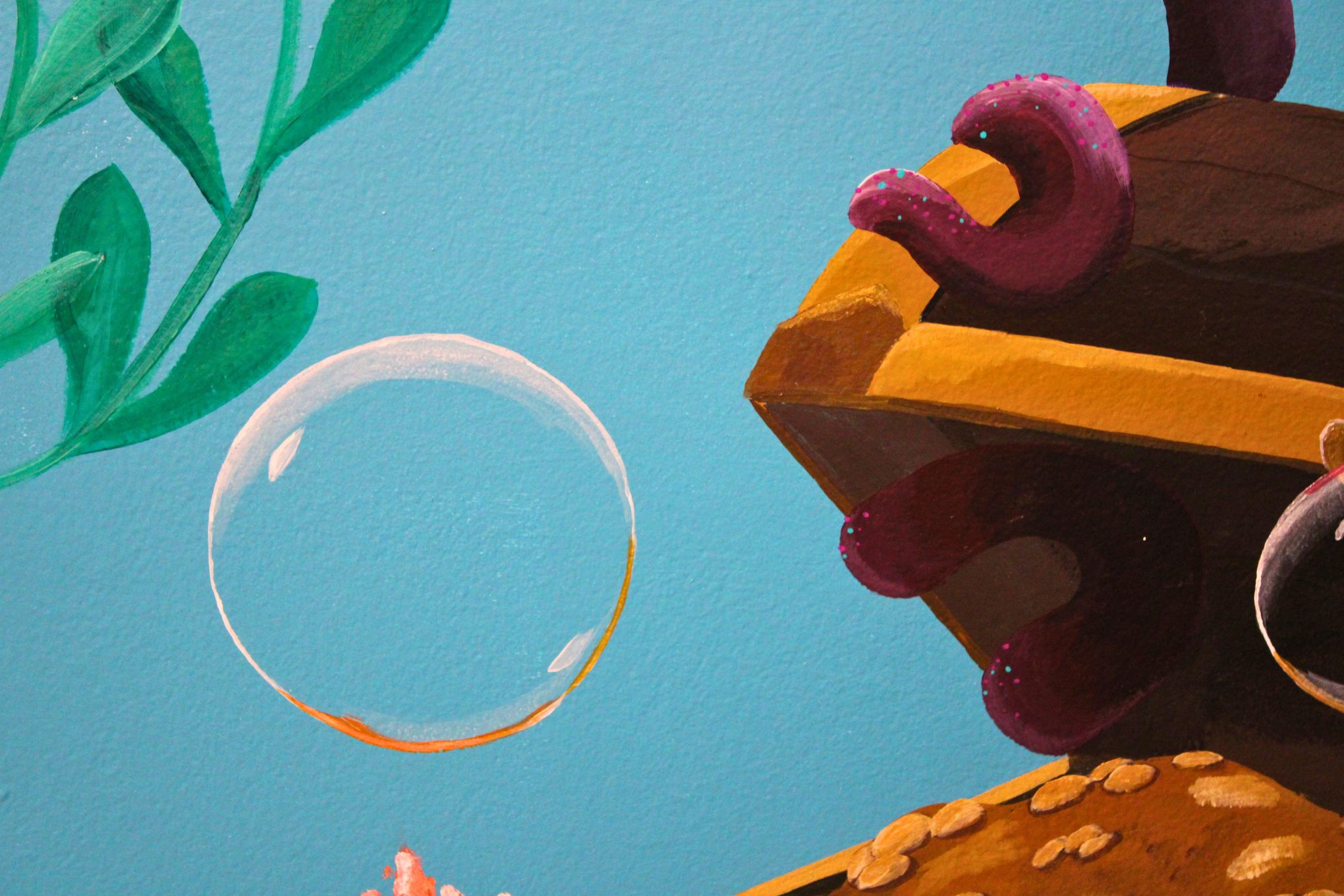 Close-up bubble detail on a residential mural