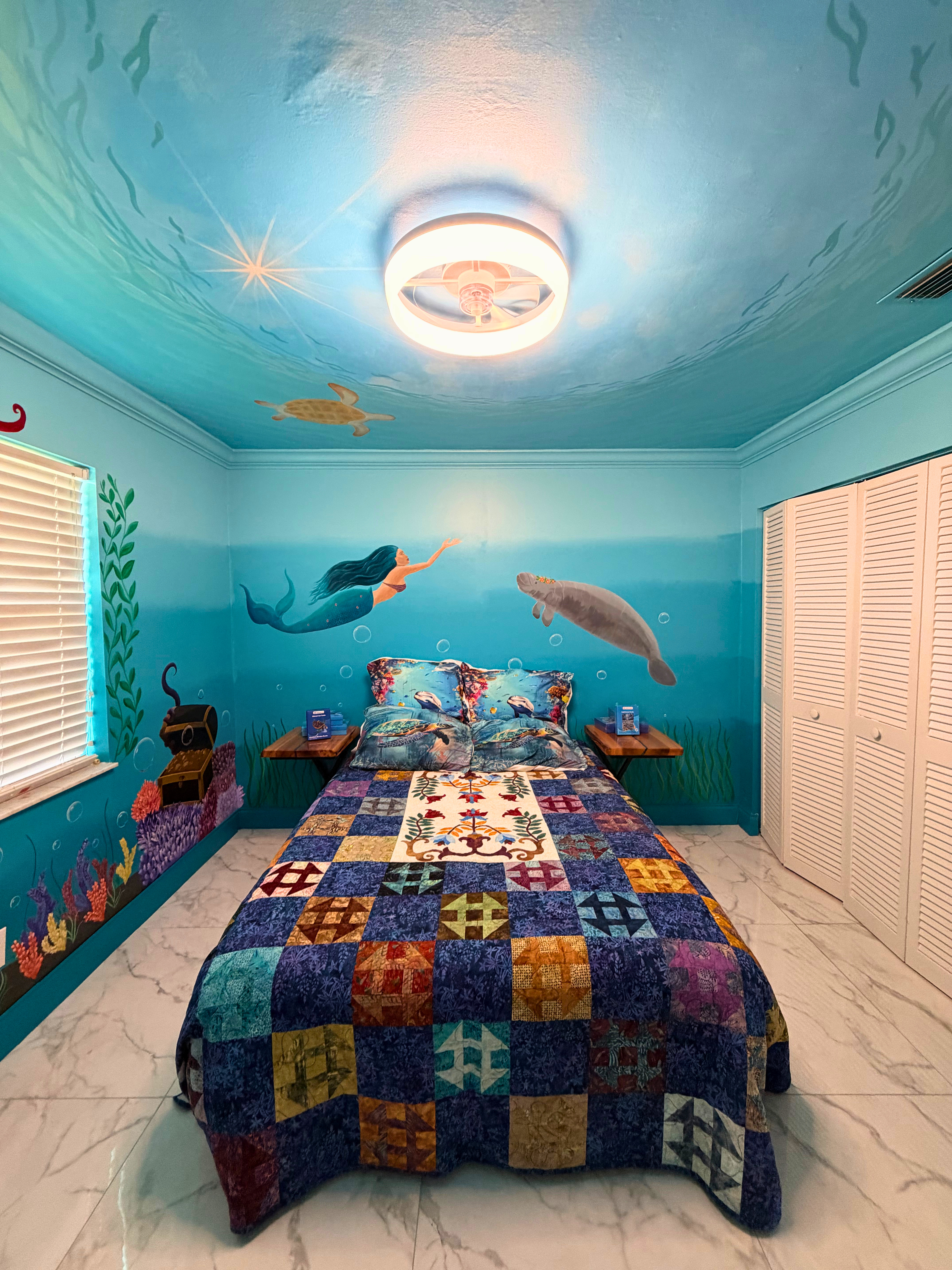 Ceiling mural with overhead lighting
